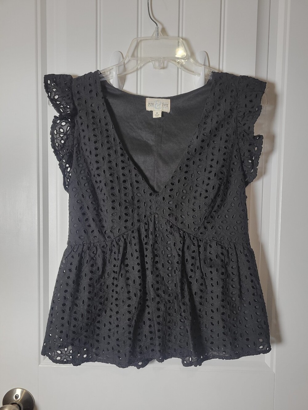 Lush Black Eyelet V-Neck Peplum Top with Flutter Sleeves by June & Ivy.  Size M